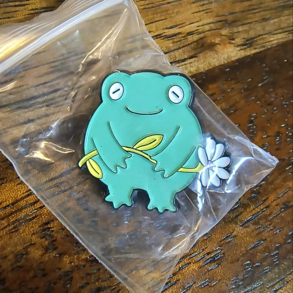 Green cartoon frog white flower enamel pin backpack clothes hat denim bag cap